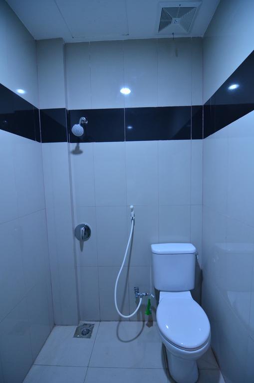 Galaxy Inn Baubau Kamer foto